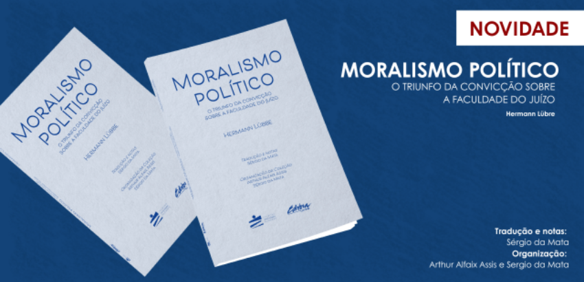 Capa azul do livro “Moralismo Político”, de Hermann Lübbe, apoiado em uma superfície de madeira. Abaixo do título aparecem informações de tradução e organização por Sérgio da Mata e Arthur Assis.