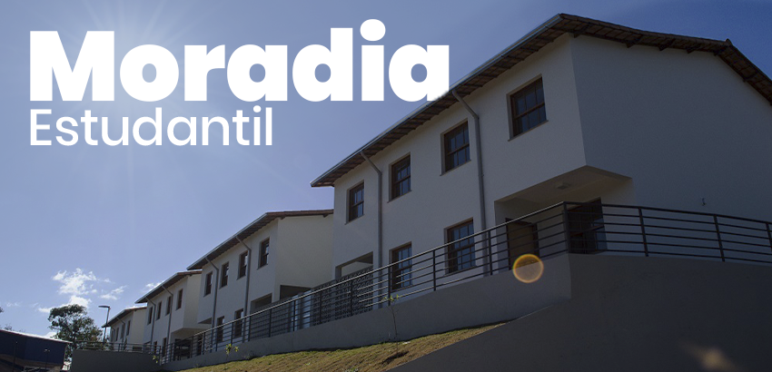 Imagem de um conjunto de prédios claros sob céu azul. Em destaque, o texto “Moradia Estudantil” em letras grandes brancas.