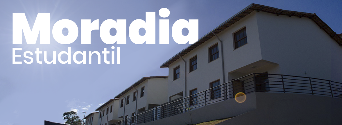 Imagem de um conjunto de prédios claros sob céu azul. Em destaque, o texto “Moradia Estudantil” em letras grandes brancas.